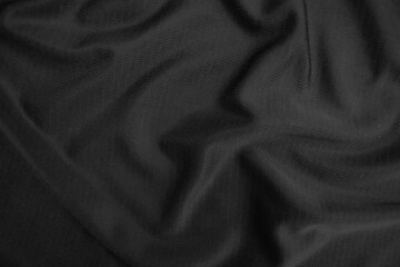 Background texture black cloth. Abstract dark wavy soft. Fabric is wrinkled. Fashion luxury style.