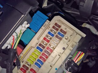 Wall Mural - High angle shot of an electrical fuse box in a car