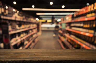 Empty wood table top on blurred market fruit. can montage or display your products