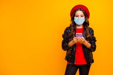 Sticker - Portrait of her she attractive healthy long-haired girl wearing safety gauze mask using device reading news mers cov copy space isolated bright vivid shine vibrant yellow color background