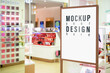 © ezstudiophoto - Mock up of vertical poster billboard with blurred cosmetic shop background.