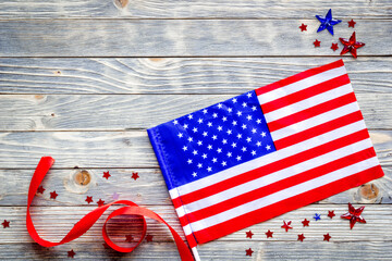 4th July celebration. American flag on wooden backrgound top view copy space