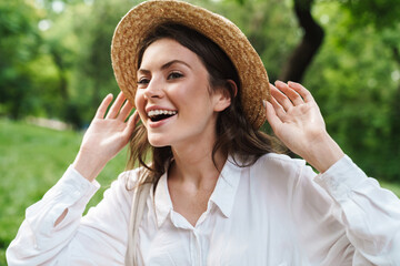 Poster - Portrait closeup of beautiful cheerful woman smiling and looking aside