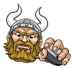 A viking hockey sports mascot cartoon character holding a puck