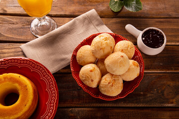 Wall Mural - Brazilian cheese buns . Table coffee in the morning with cheese bread in basket.