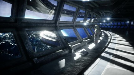 Wall Mural - alone astronaut in futuristic space corridor, room. view of the earth. cinematic 4k footage.