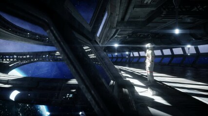 Wall Mural - alone astronaut in futuristic space corridor, room. view of the earth. cinematic 4k footage.
