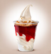 Sundae with strawberry syrup. Ice cream.
