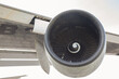 © Wonchalerm - Close-up and isolate shot with white back ground of engine, fan, propeller and wing of airplane which has been used for service for long time showing water stain and rust on the metal surface.