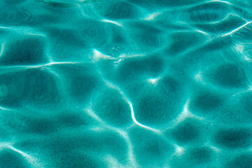 Water shadow,Pool house water texture background leafs shadows.
