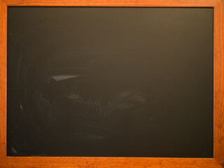 Portrait of empty blackboard with wooden frame