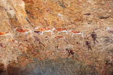 Bushmen Rock Paintings White Lady In Brandberg Mountain Area In Namibia. A Spiritual Site Of Great Significance To The San (Bushman) Tribes. Prehistoric Archeological Sign.