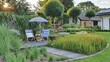 Letni ogród pełen traw, tarasdrewniany w pięknym ogrodzie, parasol przeciwsłoneczny i leżaki w ogrodzie