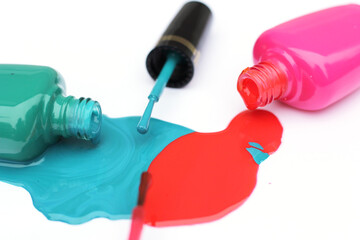 Poster - Spilled Nail Polish on White Background Pink and Green