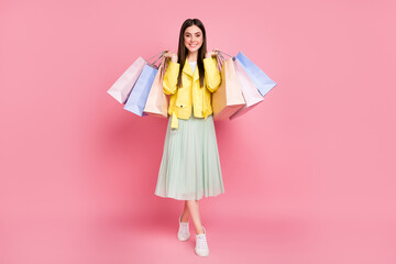 Canvas Print - Full length body size view of her she nice-looking attractive pretty fashionable cheerful cheery girl carrying new things goods isolated on bright vivid shine vibrant yellow color background