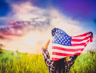 woman holding US flag independence day