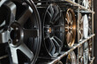 Stand with alloy wheels in modern tire store.