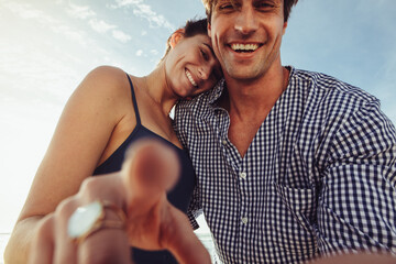 POV of woman touching device screen