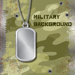 Military id tag hanging on a chain isolated on jammed camouflage background with bullet holes. Blank metal army medallion. Silver empty soldier badge for personal information of a military man.