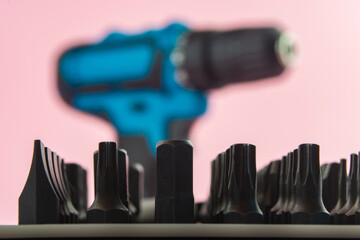 a set of metal bits for a screwdriver in plastic packaging