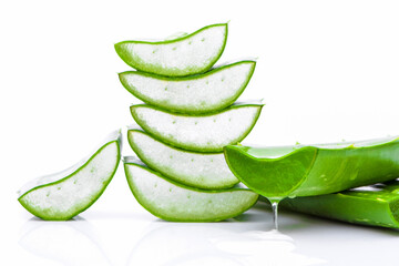 Poster - Green fresh aloe vera leaf with sliced isolated on white background.Natural herbal medical plant ,skincare ,health and beauty spa concept. 