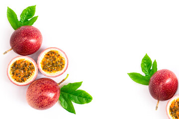 Wall Mural - Closeup passionfruit ( maracuya ) or passion fruits and half slice with green leaves isolated on white background. top view. Flat lay. 