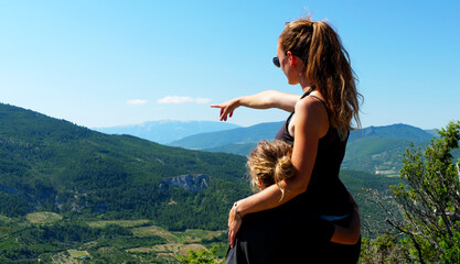 woman and child looking at beautiful landscape- drome provence in France