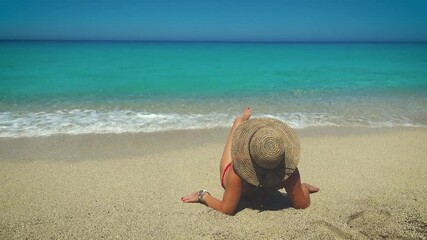 Wall Mural - Woman enjoying the beach at Greek island r