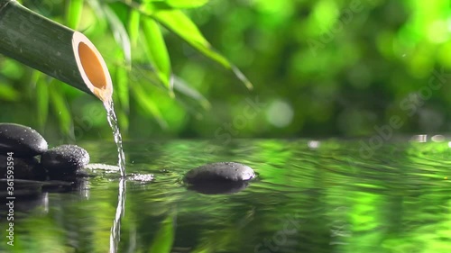 Fototapeta Bamboo fountain and spa stones