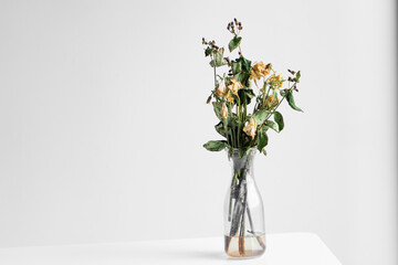 Wall Mural - Bouquet of wilted flowers on a white background