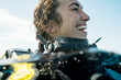 Woman Smiling while Scuba Diving with joyful toothy grin during tropical underwater adventure with mask 