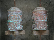 Two Basic Spinning Prayer Wheels In Nepal