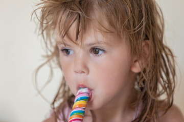  little girls with lollipops