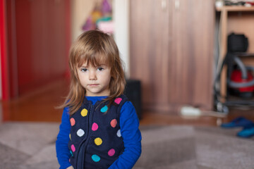 a cute girl playing at home