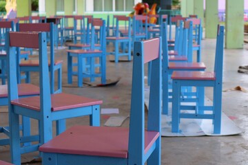 Wall Mural - colorful chairs in a restaurant