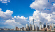 Aerial view of the Skyline of Manhattan in sunny day, New York City, United States. Shot from Hudson River 