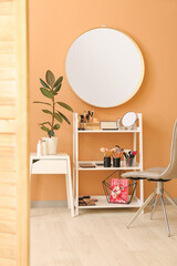 Wall Mural - Rack with decorative cosmetics and mirror in modern makeup room