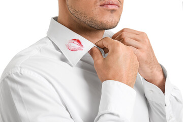 Sticker - Young businessman with lips print on shirt collar against white background, closeup