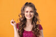 © Pixel-Shot - Beautiful young woman with stylish hairdo on color background
