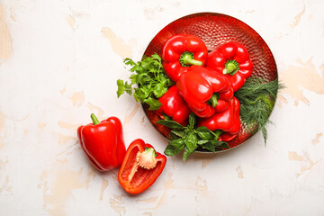 Wall Mural - Plate with red bell pepper on table