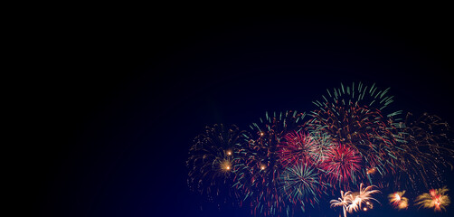 colorful fireworks on dark blue background