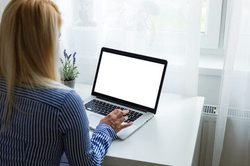 Side view of Open laptop computer. Modern thin edge slim design. Blank white screen display for mockup and gray metal aluminum material body isolated on blue background