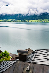 Poster - Austrian landscape with boat hangars