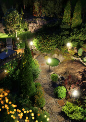 Wall Mural - Garden patio party festive illumination in the evening