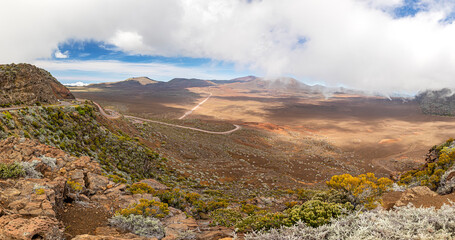 Wall Mural - Panoramic view of the Plaine des Sable with way to volcano Piton de la Fournaise at island La Reunion