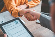 © photobyphotoboy - HR managers join hands with job applicants, accept proposals and agree to work together in the company.