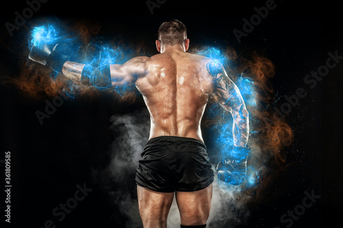 Athlete bodybuilder in blue energy lights Lerretsbilde