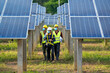 © visoot - Solar power plant,Electrician wearing a medicine healthcare mask working and checking solar plant at solar power station,Climate change and renewable energy.