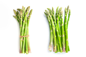 A bunch of asparagus on a white isolated background. Flat lay. The concept of proper nutrition.