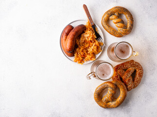 Wall Mural - Beer, pretzels, sausages and stewed sauerkraut